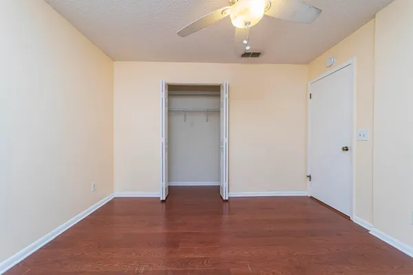 an empty room with a bathroom