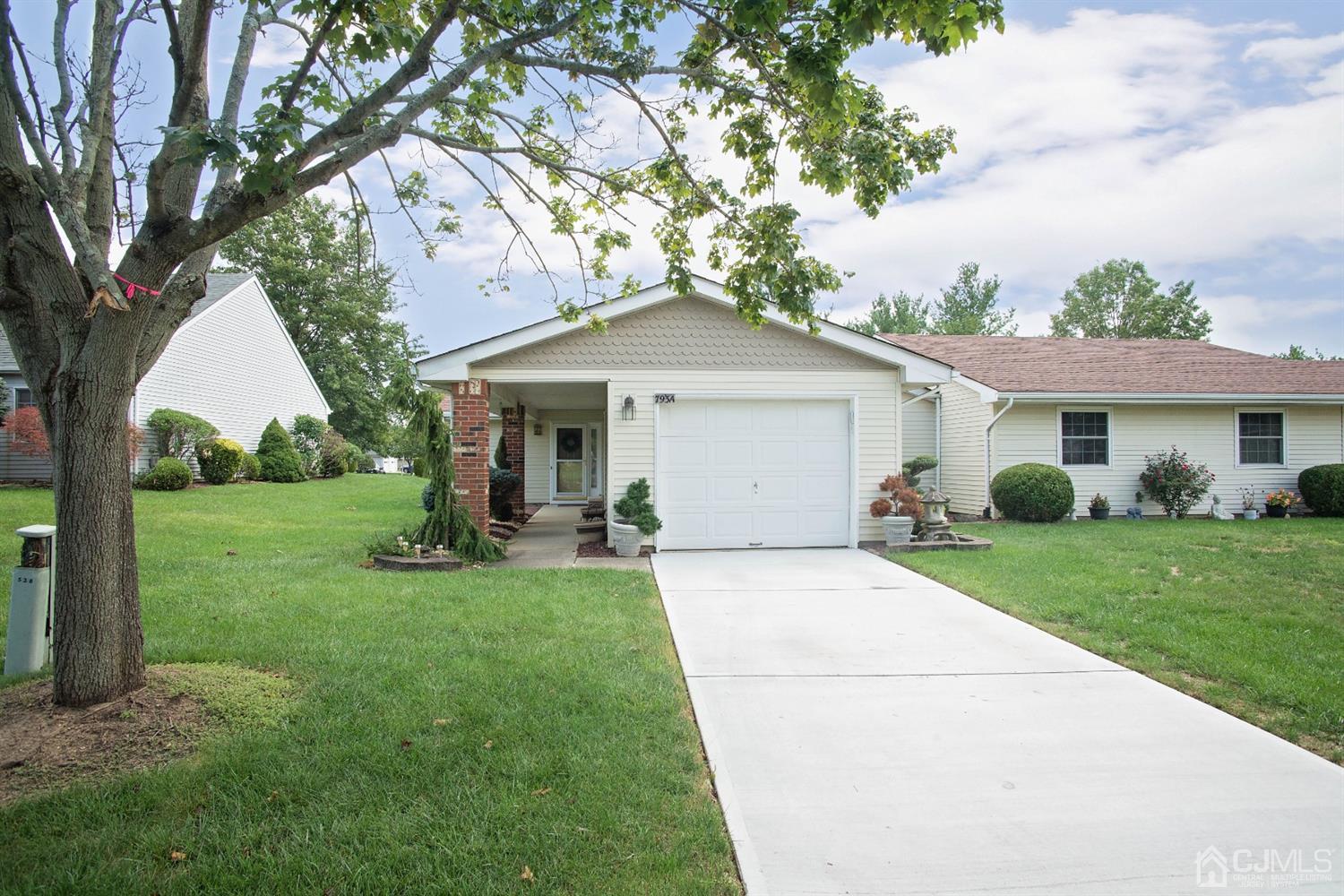 793 Pompton Road, Unit A Monroe Township, NJ 08831 - Photo 1 of 15 a front view of a house with yard and green space