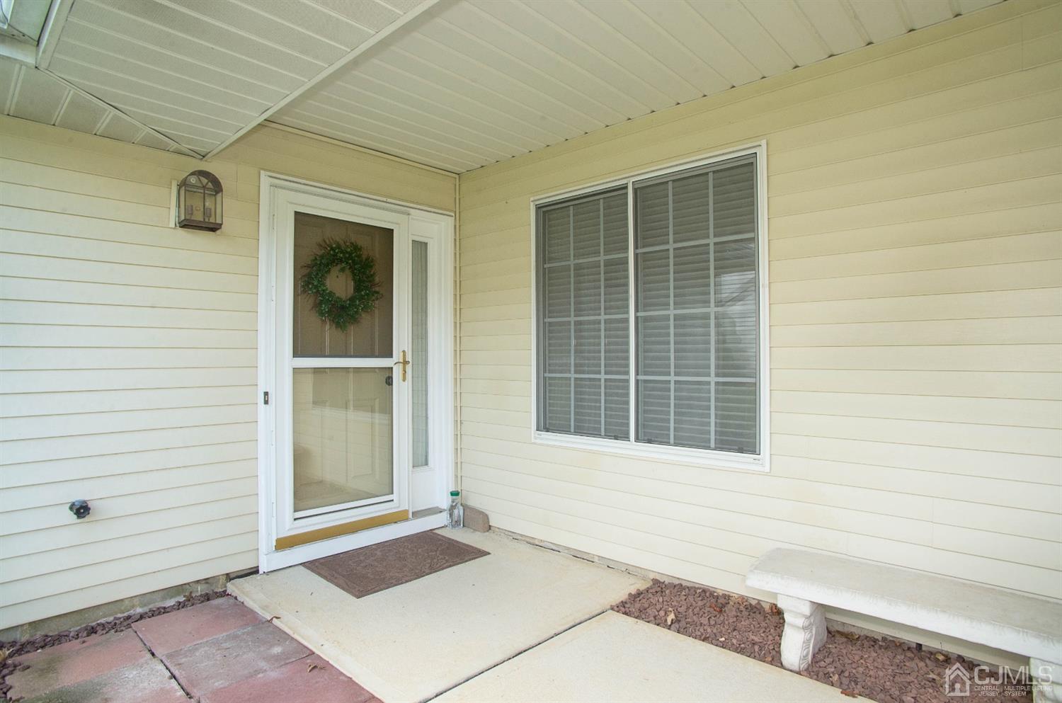 793 Pompton Road, Unit A Monroe Township, NJ 08831 - Photo 2 of 15 a view of an empty room with a window