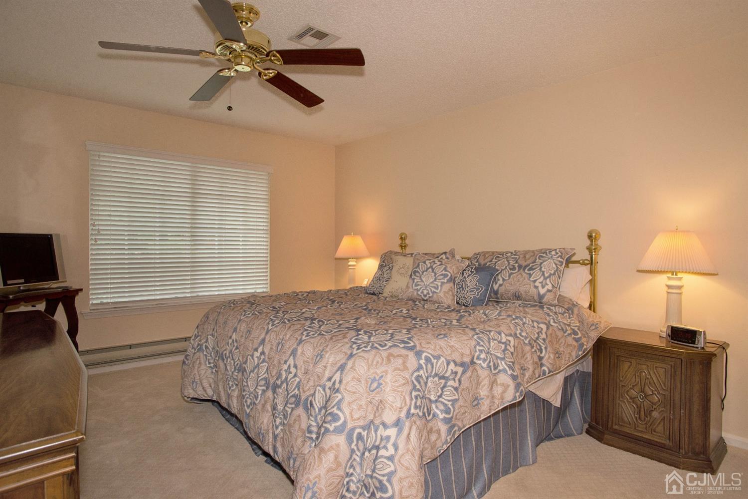 793 Pompton Road, Unit A Monroe Township, NJ 08831 - Photo 12 of 15 a bedroom with a bed and a window