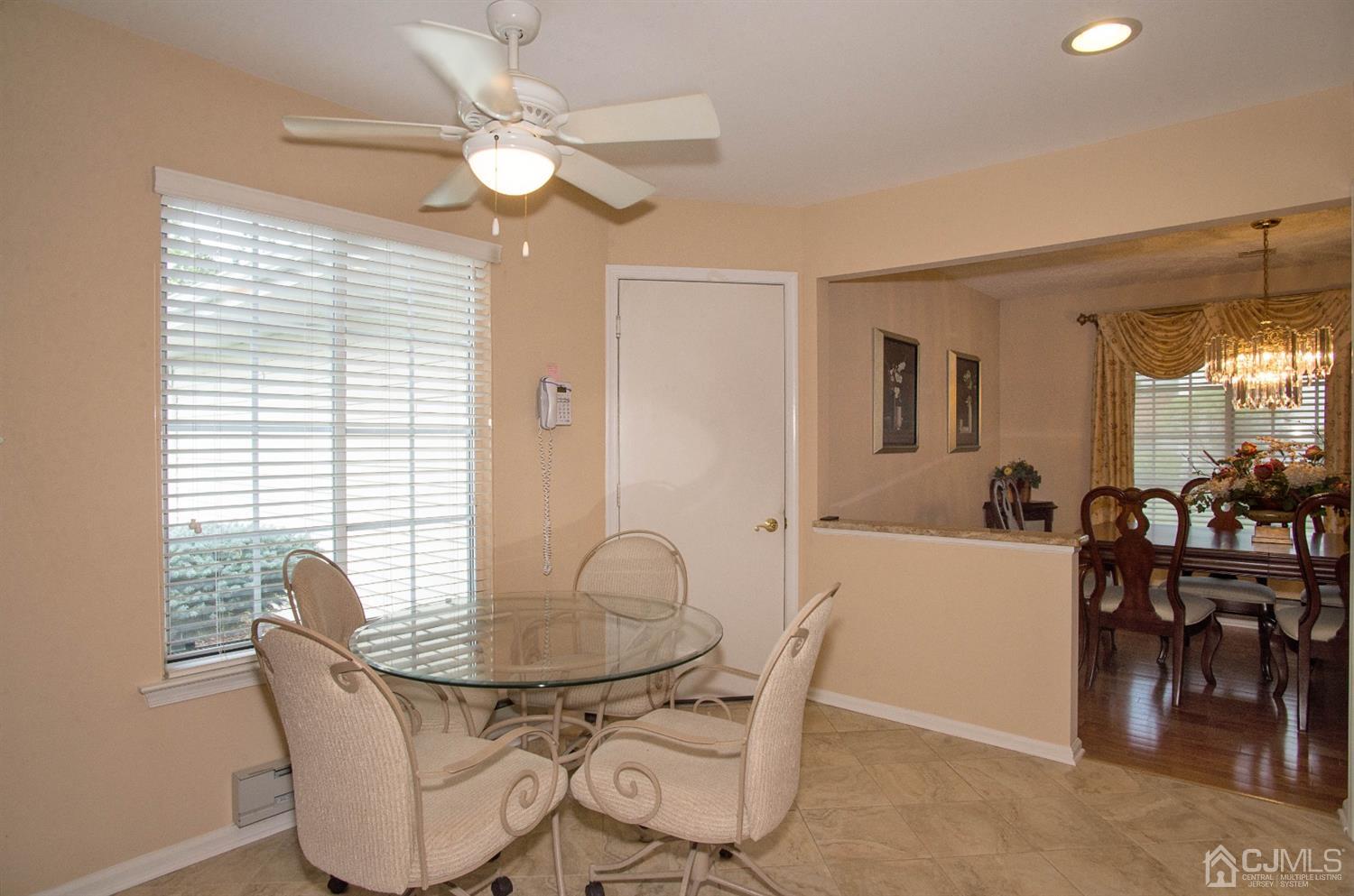 793 Pompton Road, Unit A Monroe Township, NJ 08831 - Photo 5 of 15 a dining room with furniture and window