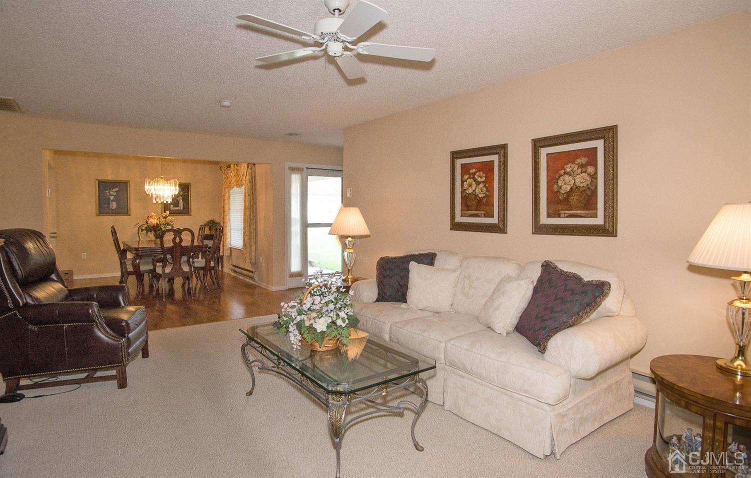 793 Pompton Road, Unit A Monroe Township, NJ 08831 - Photo 8 of 15 a living room with furniture and wooden floor