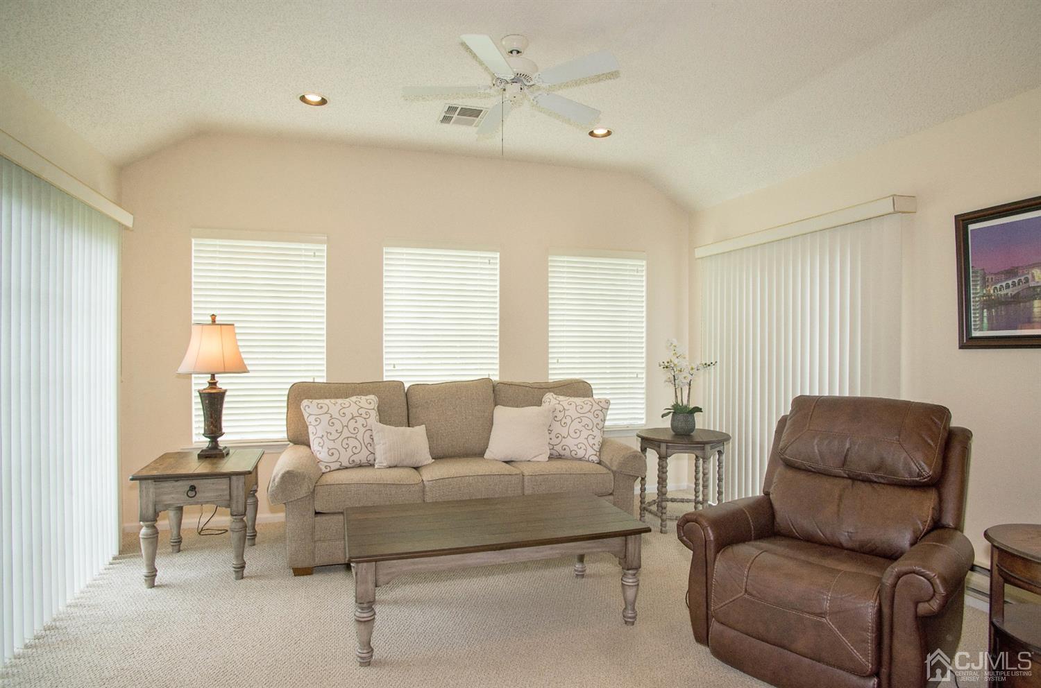 793 Pompton Road, Unit A Monroe Township, NJ 08831 - Photo 10 of 15 a living room with furniture and a large window
