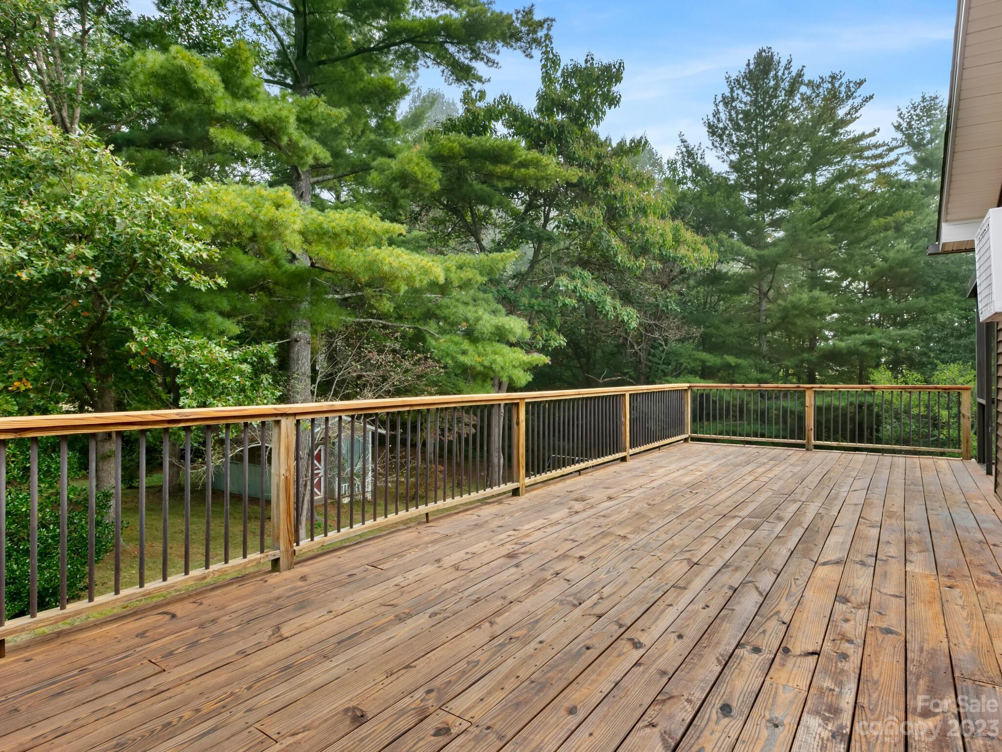 98 Pinecrest Drive Alexander, NC 28701 - Photo 25 of 32 a view of balcony with wooden floor and fence