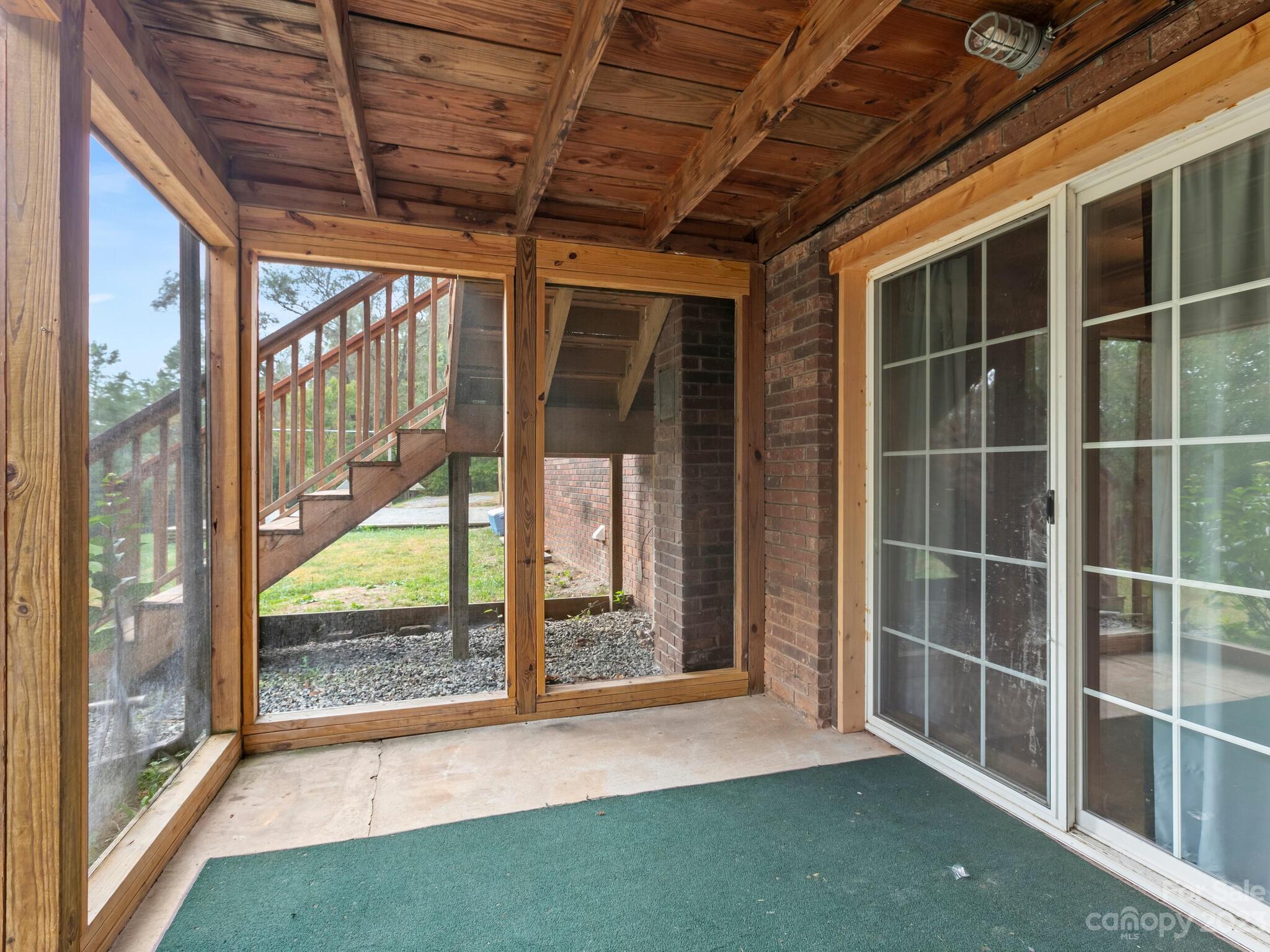 98 Pinecrest Drive Alexander, NC 28701 - Photo 28 of 32 a view of an empty room with a large window