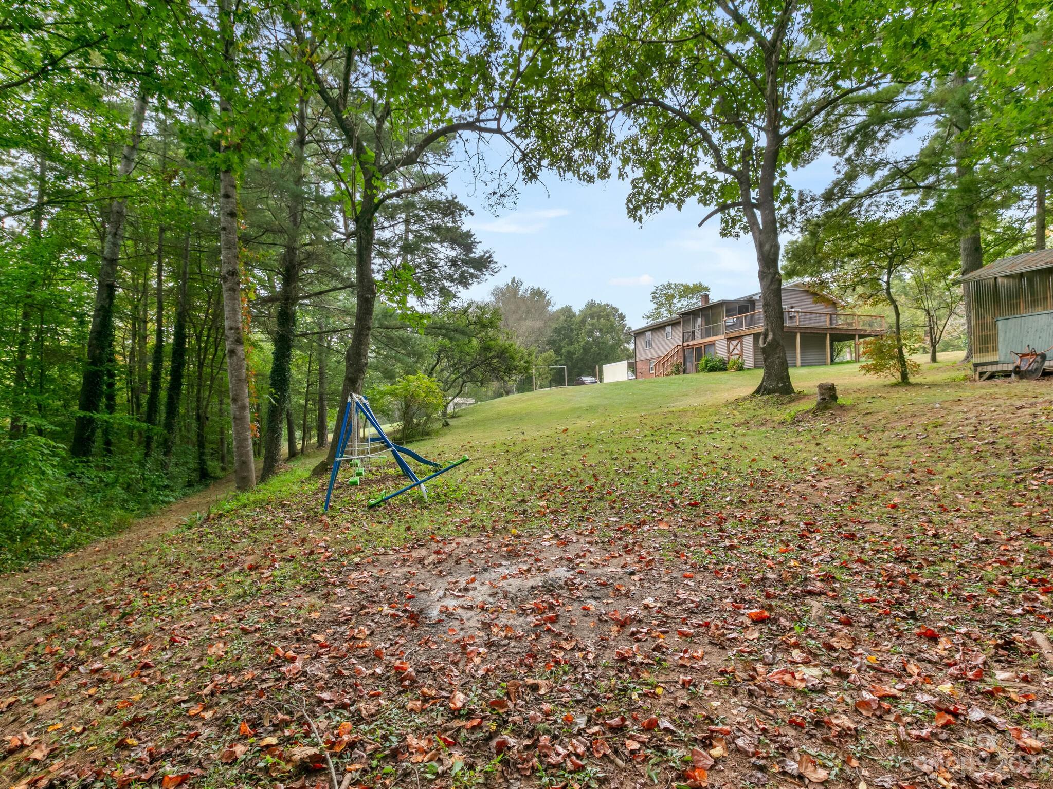 98 Pinecrest Drive Alexander, NC 28701 - Photo 32 of 32 a view of a yard with a tree