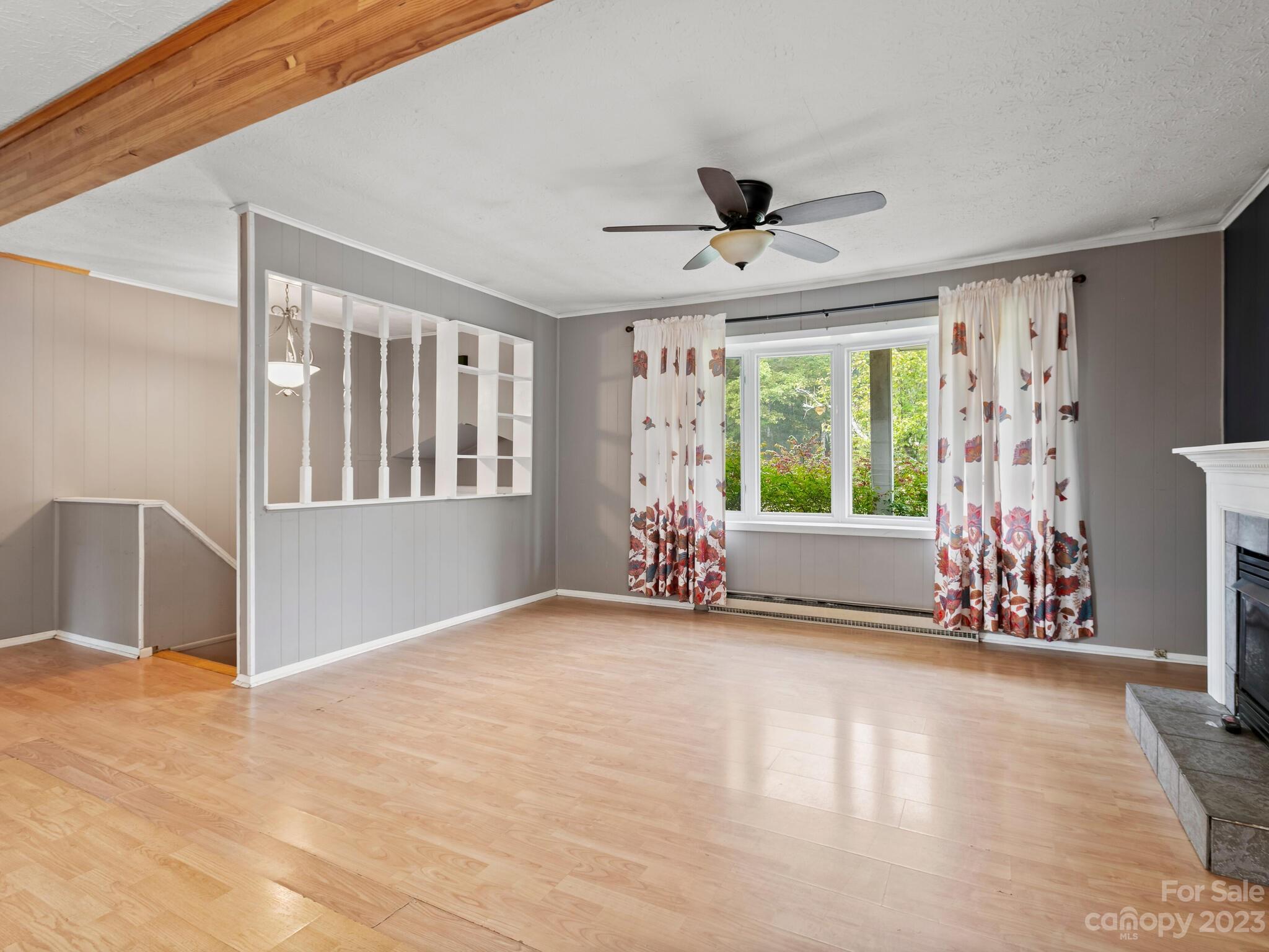 98 Pinecrest Drive Alexander, NC 28701 - Photo 5 of 32 a view of an empty room with a window