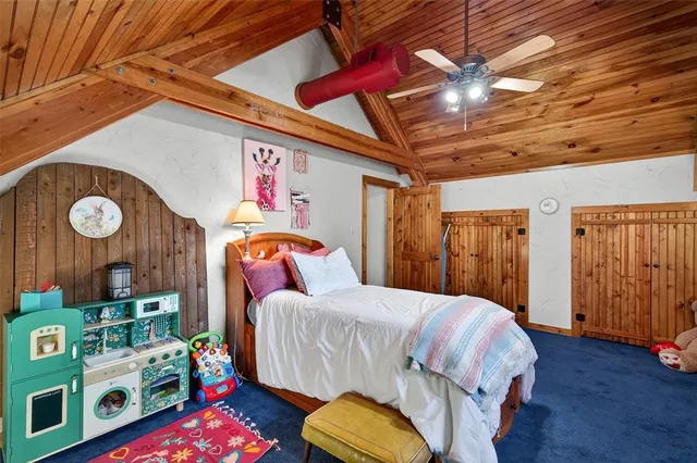 a view of a house with a snow on the road