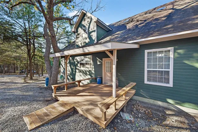a view of backyard with seating space