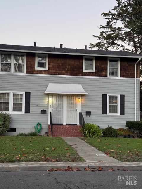 136 Calhoun Street Vallejo, CA 94590 - Photo 2 of 3 a front view of a house with a garden