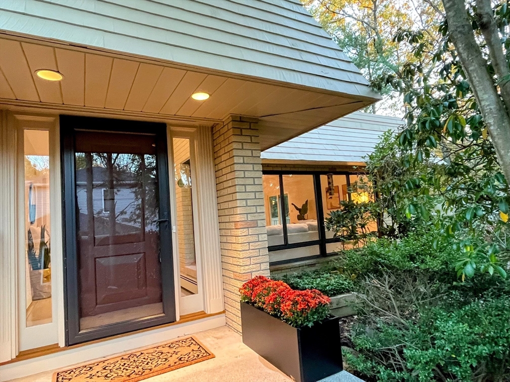 a front view of a house with a porch