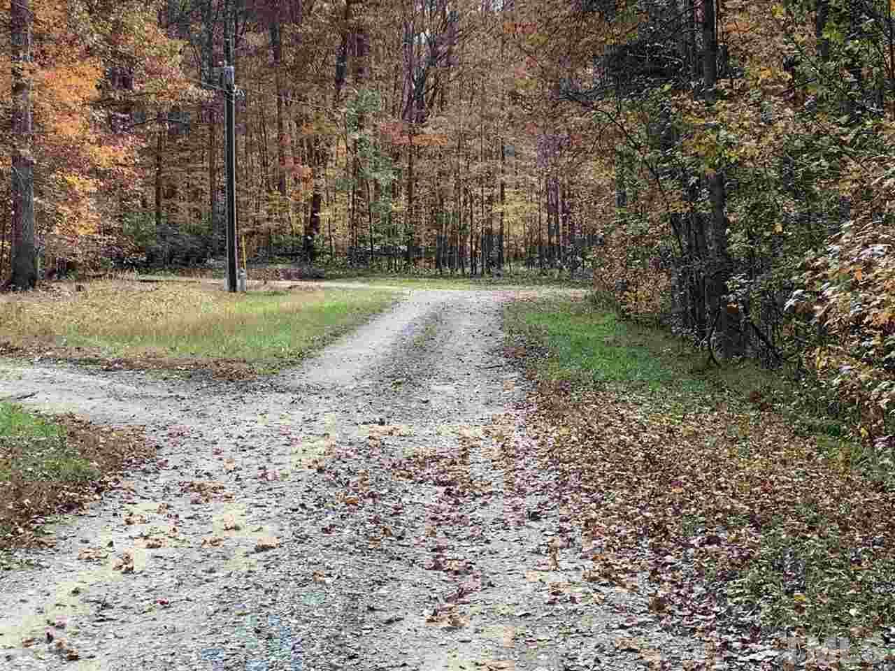 6416 Coltsfoot Drive Rougemont, NC 27572 - Photo 4 of 5 a view of a park with large trees