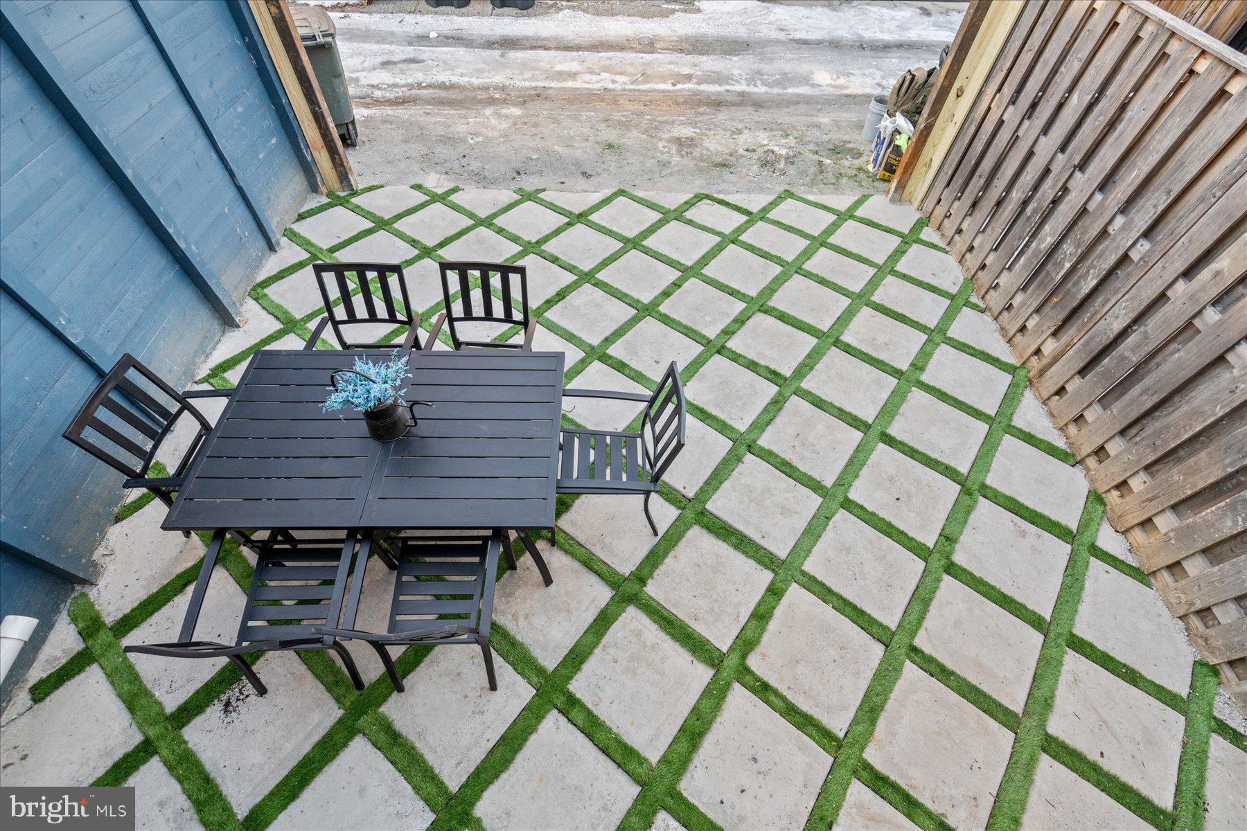 131 Randolph Place Northwest Washington, DC 20001 - Photo 17 of 41 Latticed parking/patio offer dining alternative