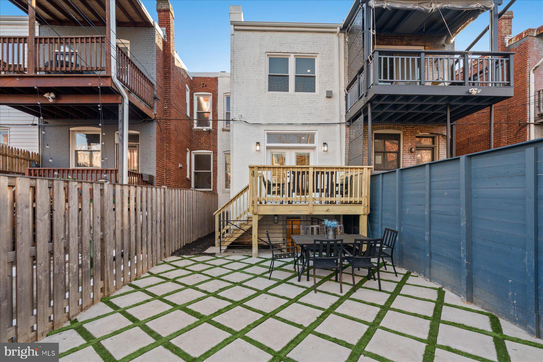 131 Randolph Place Northwest Washington, DC 20001 - Photo 40 of 41 Patio and parking with custom roll up door