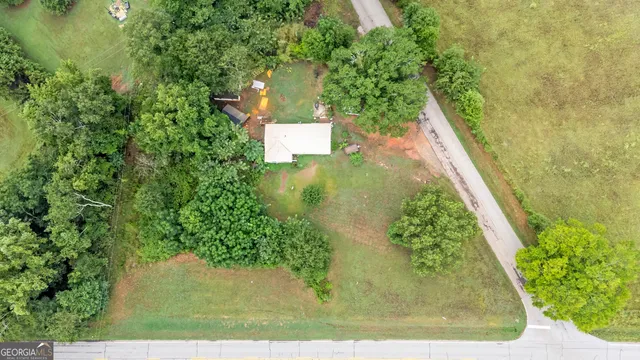 a view of a garden with a fountain