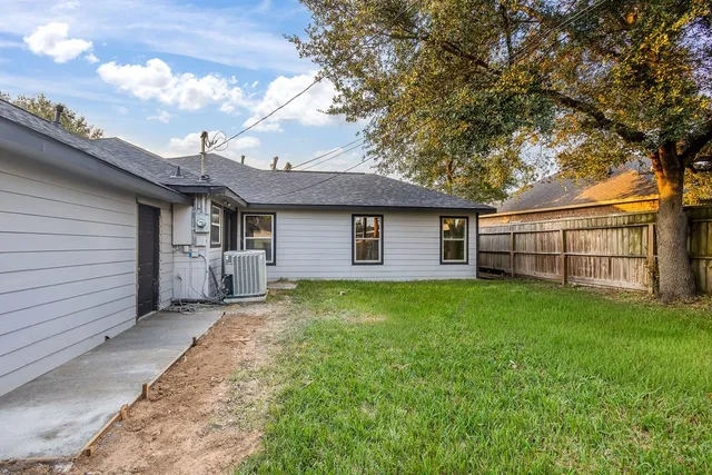 a view of a backyard with a garden