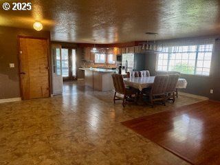 443 9th Street Metolius, OR 97741 - Photo 13 of 22 a dining room with furniture and wooden floor