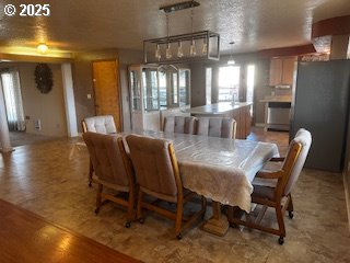 443 9th Street Metolius, OR 97741 - Photo 14 of 22 a view of a dining room with furniture