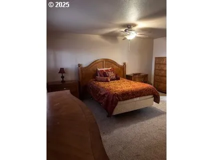 a view of an empty room with windows