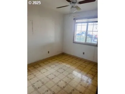 a view of a room with a stove and a window