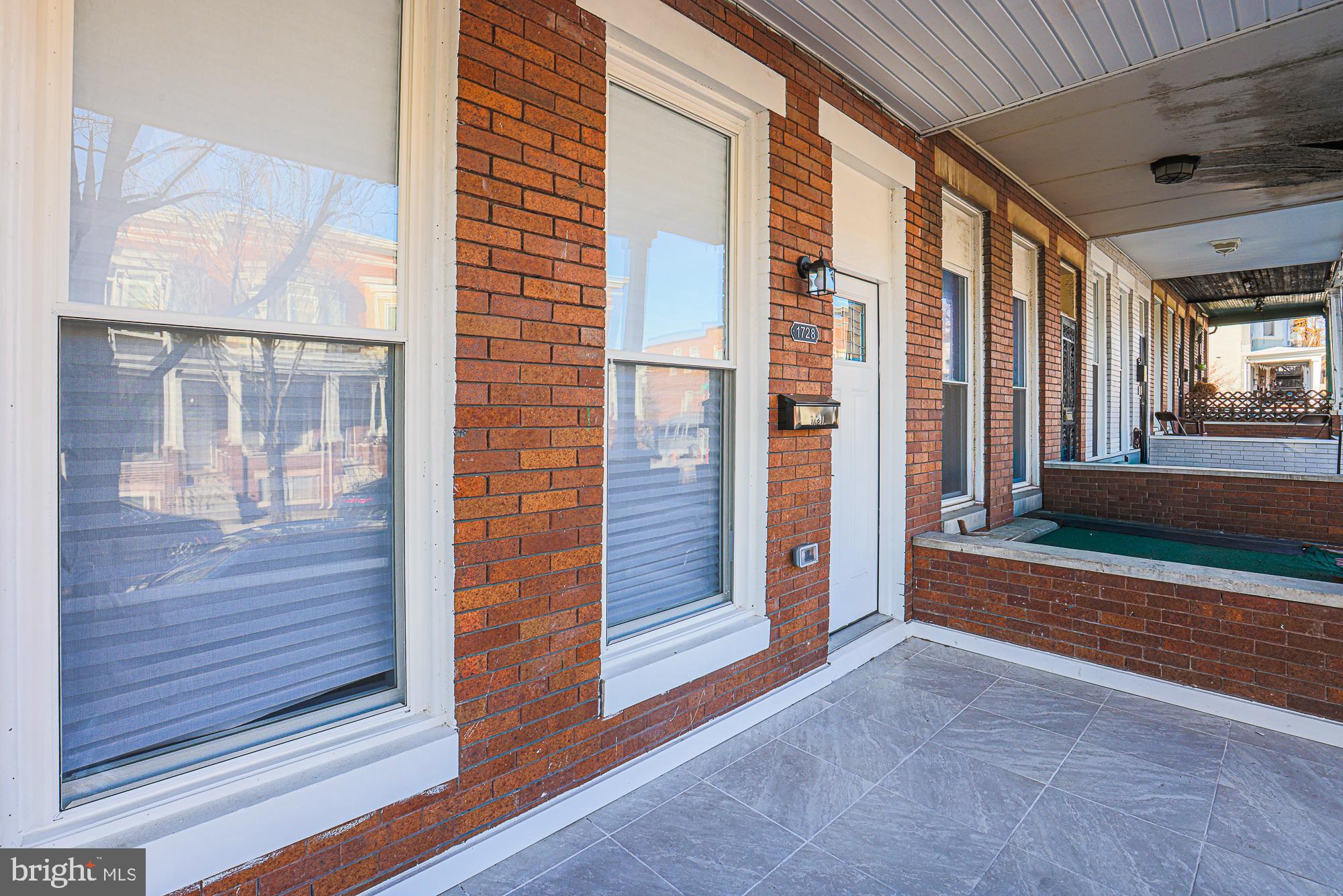 1728 Ruxton Avenue Baltimore, MD 21216 - Photo 3 of 43 a view of front door of house
