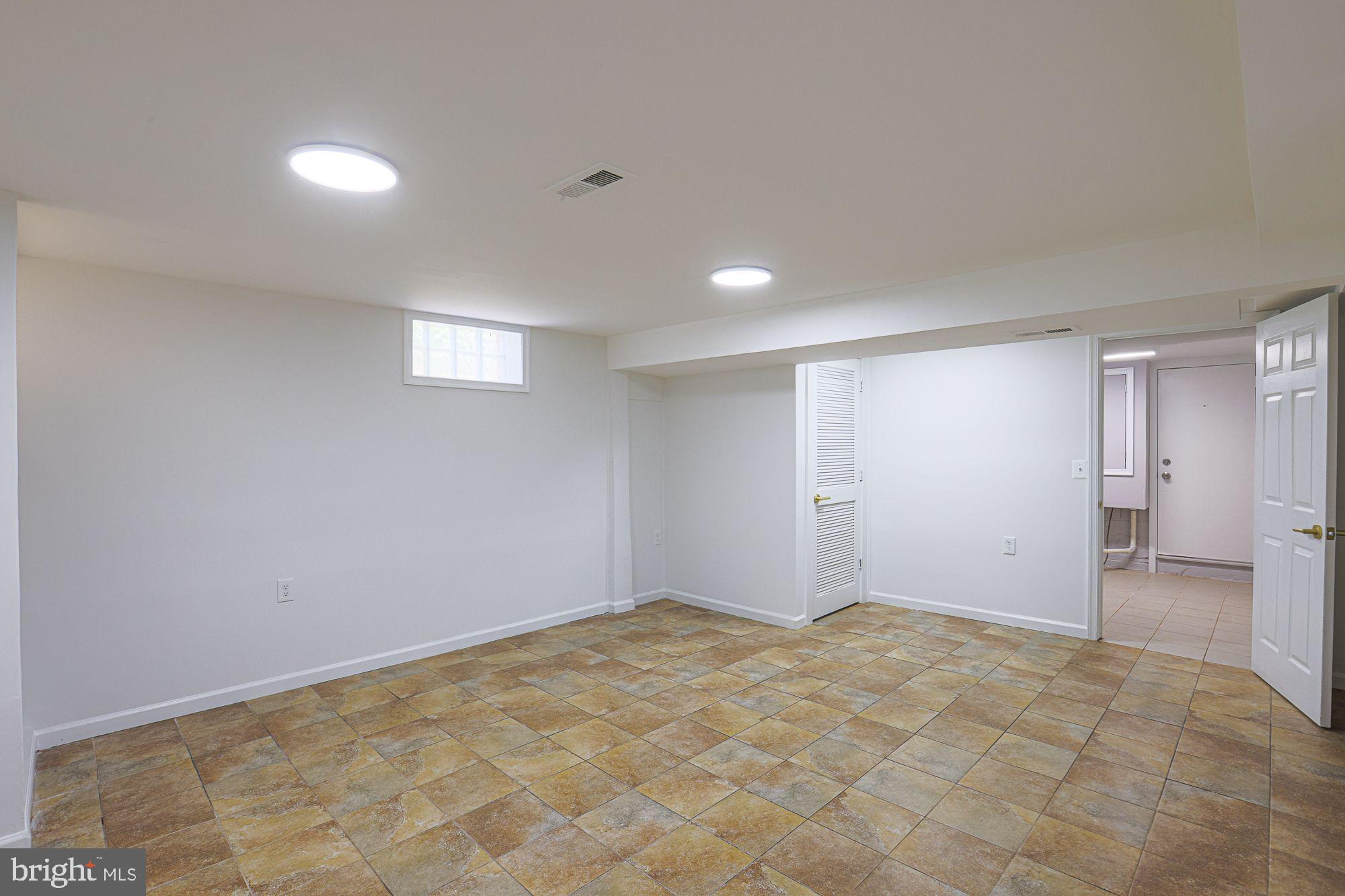 6203 Hopeton Avenue Baltimore, MD 21215 - Photo 12 of 18 a view of an empty room