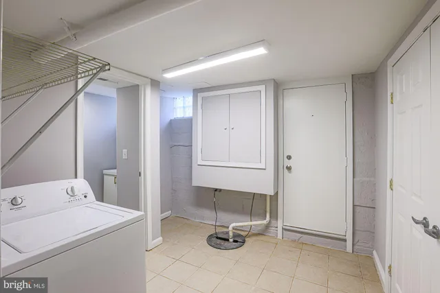 a view of a bathroom with a sink and mirror