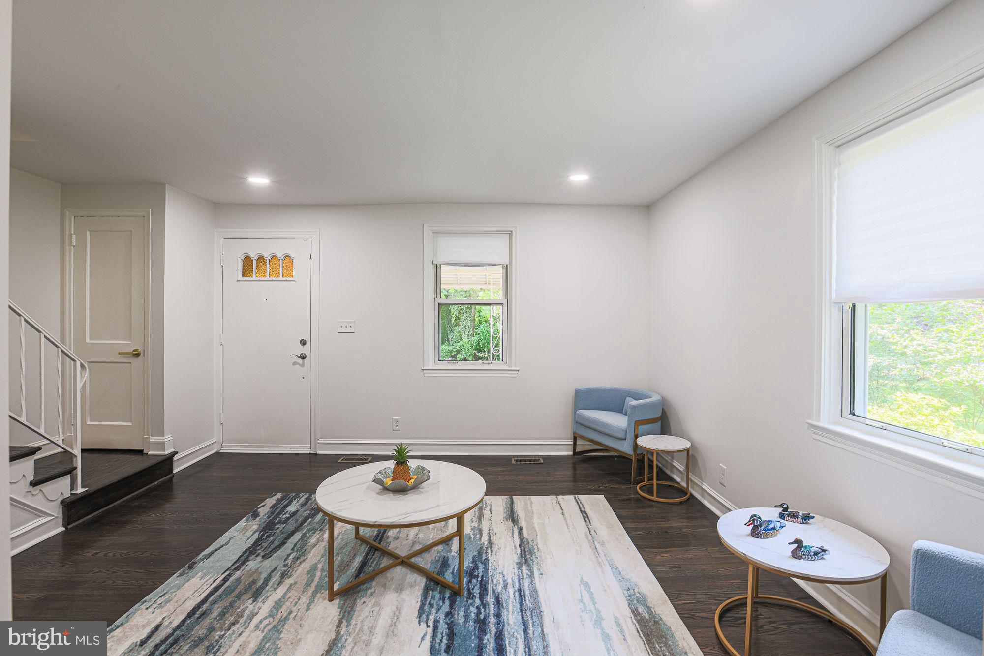 6203 Hopeton Avenue Baltimore, MD 21215 - Photo 4 of 18 a living room with furniture and a window