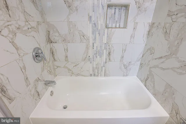 a bathroom with a bathtub