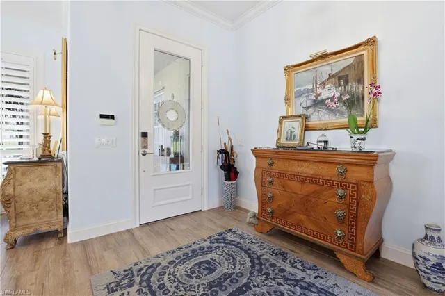 a room with painting and a table