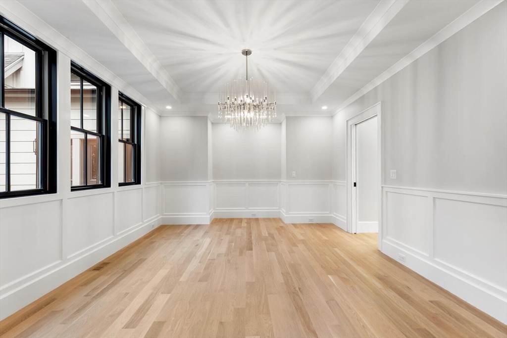 969 South Street Needham, MA 02492 - Photo 12 of 32 a view of an empty room with wooden floor and a window