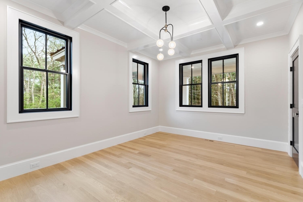 969 South Street Needham, MA 02492 - Photo 14 of 32 a view of an empty room with wooden floor and a window