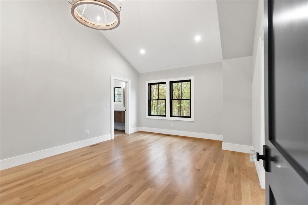 969 South Street Needham, MA 02492 - Photo 20 of 32 an empty room with wooden floor and windows