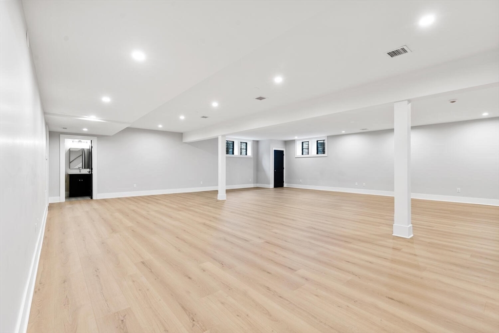 969 South Street Needham, MA 02492 - Photo 23 of 32 a view of an empty room with wooden floor