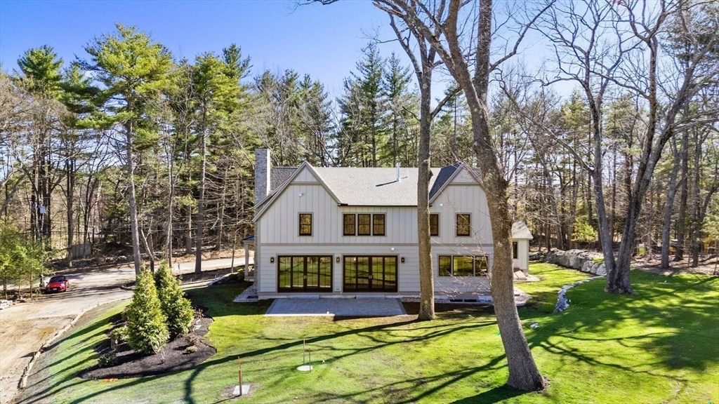 969 South Street Needham, MA 02492 - Photo 28 of 32 a view of a house with backyard porch and sitting area