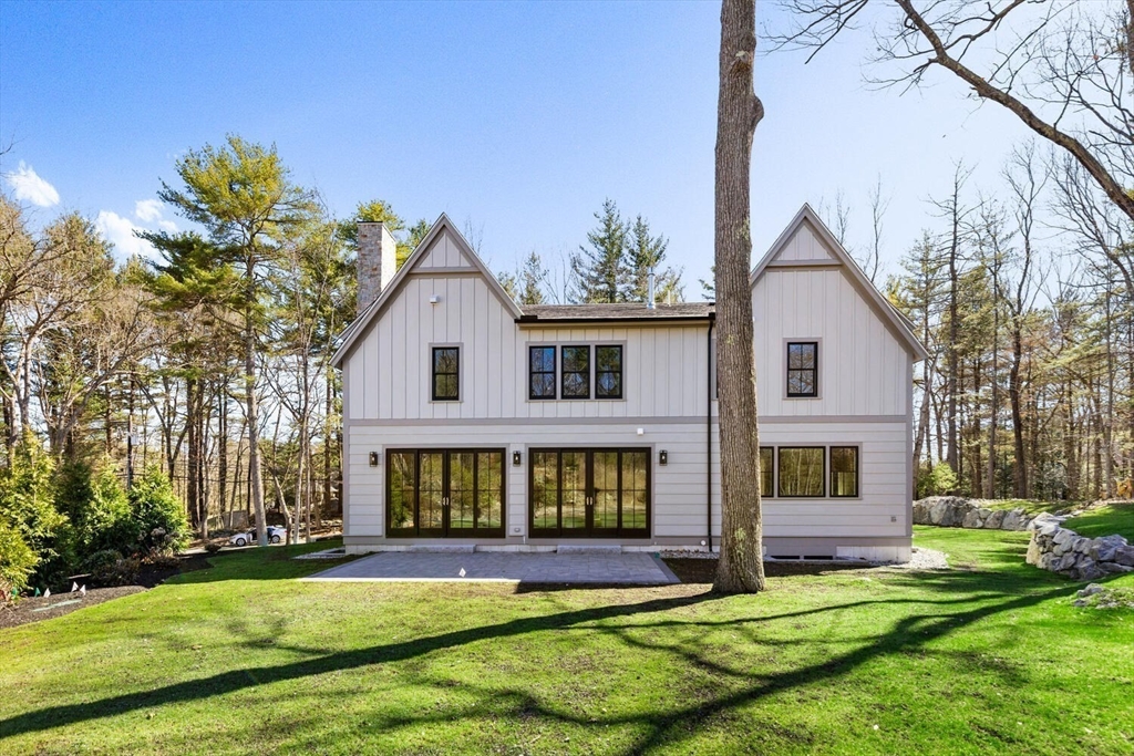969 South Street Needham, MA 02492 - Photo 29 of 32 a front view of a house with a yard