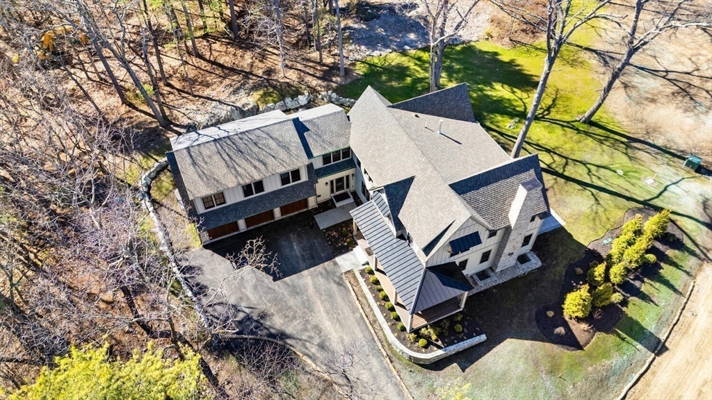 969 South Street Needham, MA 02492 - Photo 32 of 32 a view of a backyard with plants and a patio