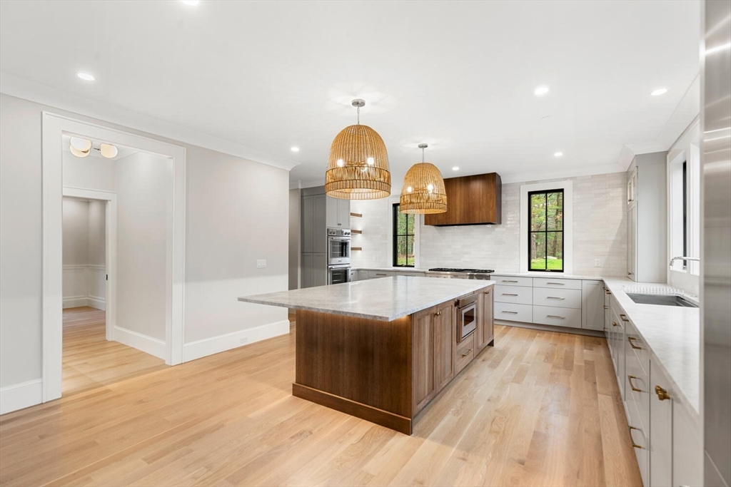 969 South Street Needham, MA 02492 - Photo 10 of 32 a large white kitchen with a large window