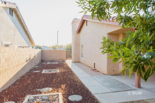 905 Harriet Street Ridgecrest, CA 93555 - Photo 33 of 34 a view of a backyard with plants