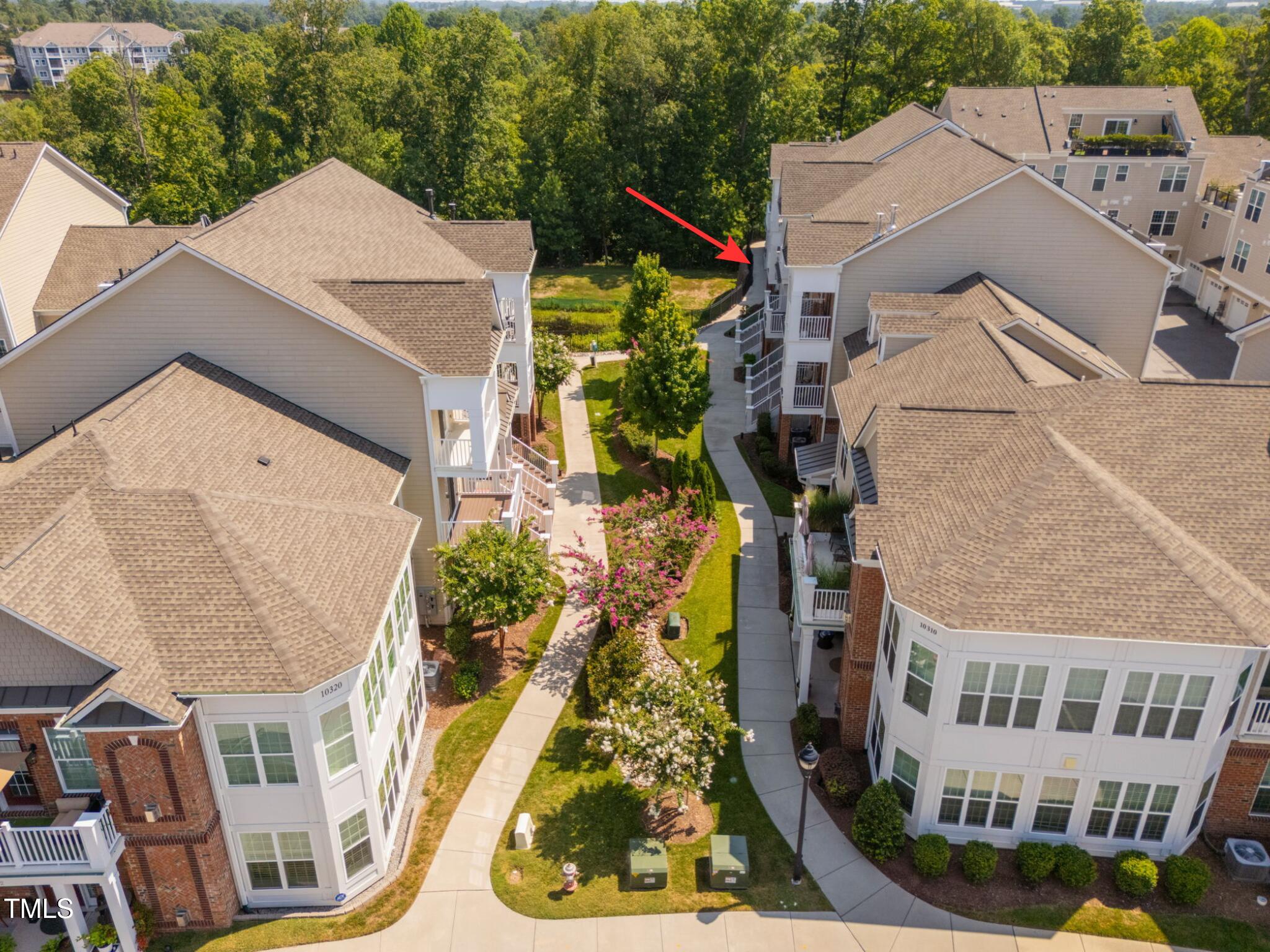 10310 Sablewood Drive, Unit 111 Raleigh, NC 27617 - Photo 5 of 46 Sablewood Arrows2