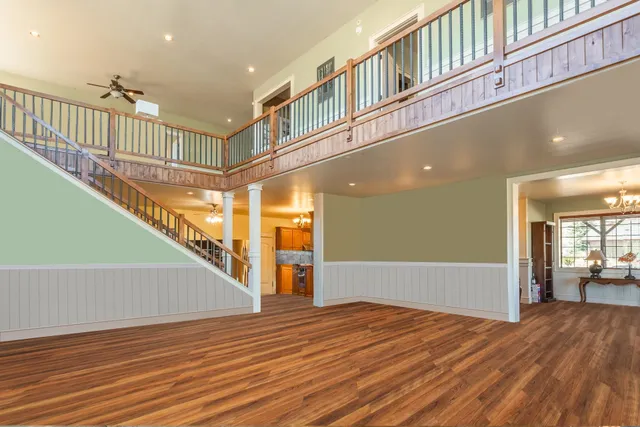 a view of an entryway with wooden floor