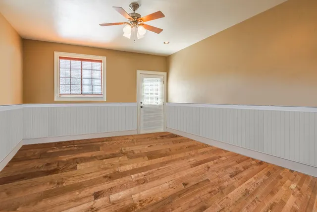 a view of an empty room and window