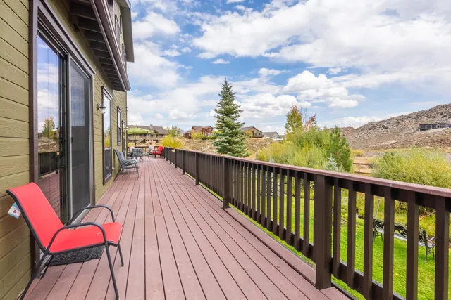a balcony with wooden floor