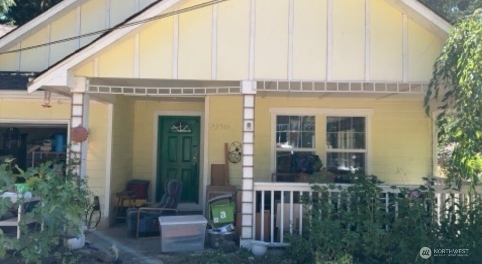 22901 2nd Avenue Southeast Bothell, WA 98021 - Photo 1 of 1 a front view of a house with a garden