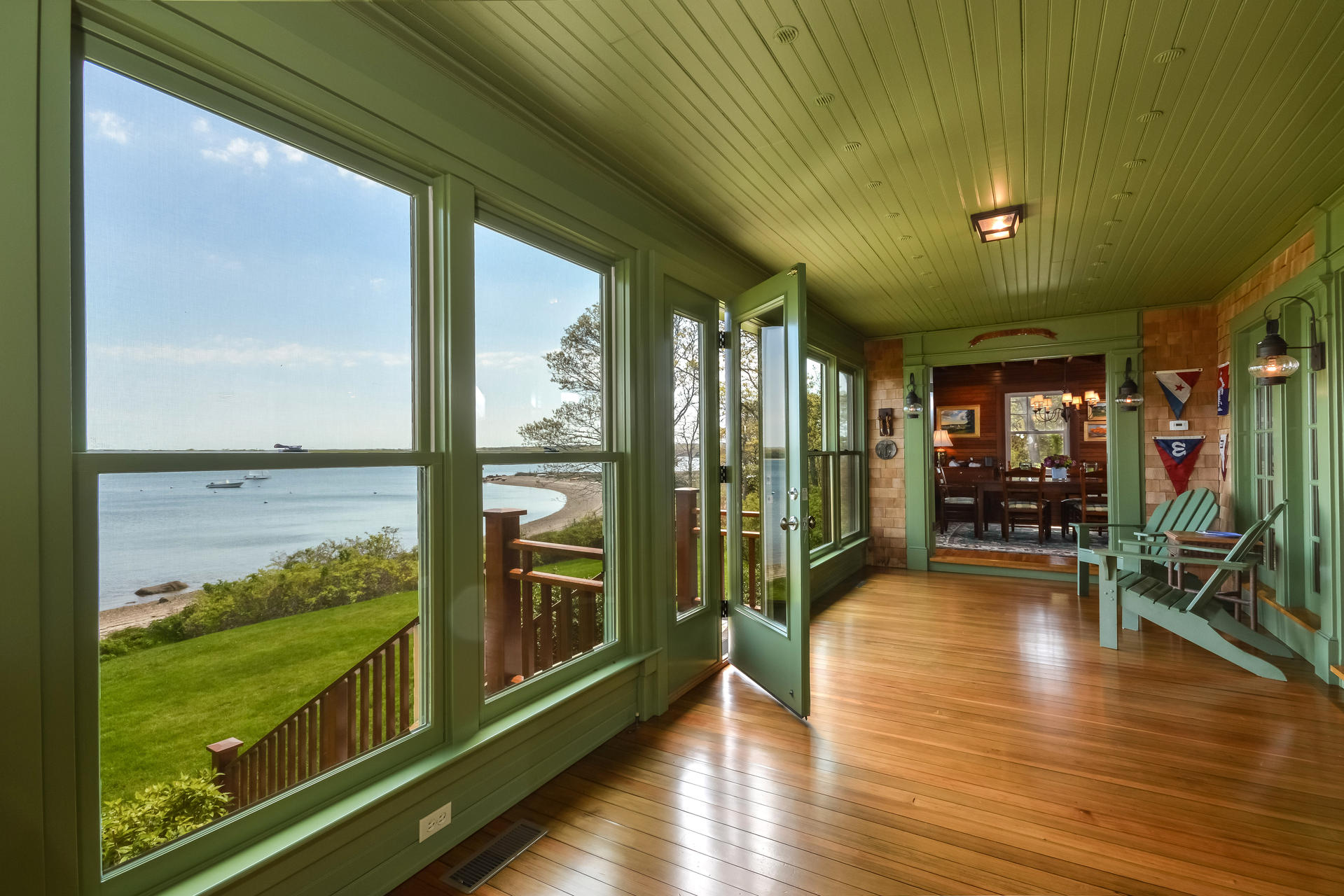 438 Scraggy Neck Road Cataumet, MA 02534 - Photo 13 of 33 a view of a livingroom with furniture wooden floor and front door