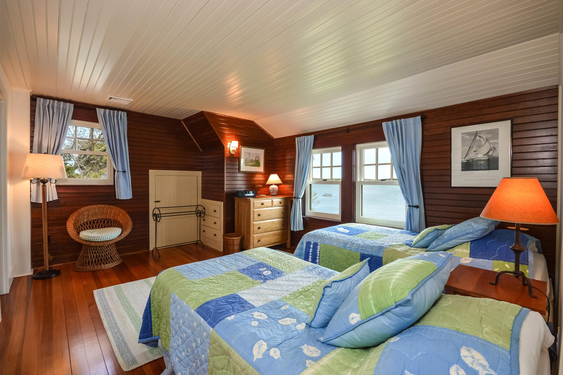 438 Scraggy Neck Road Cataumet, MA 02534 - Photo 20 of 33 a bedroom with two beds and a large window