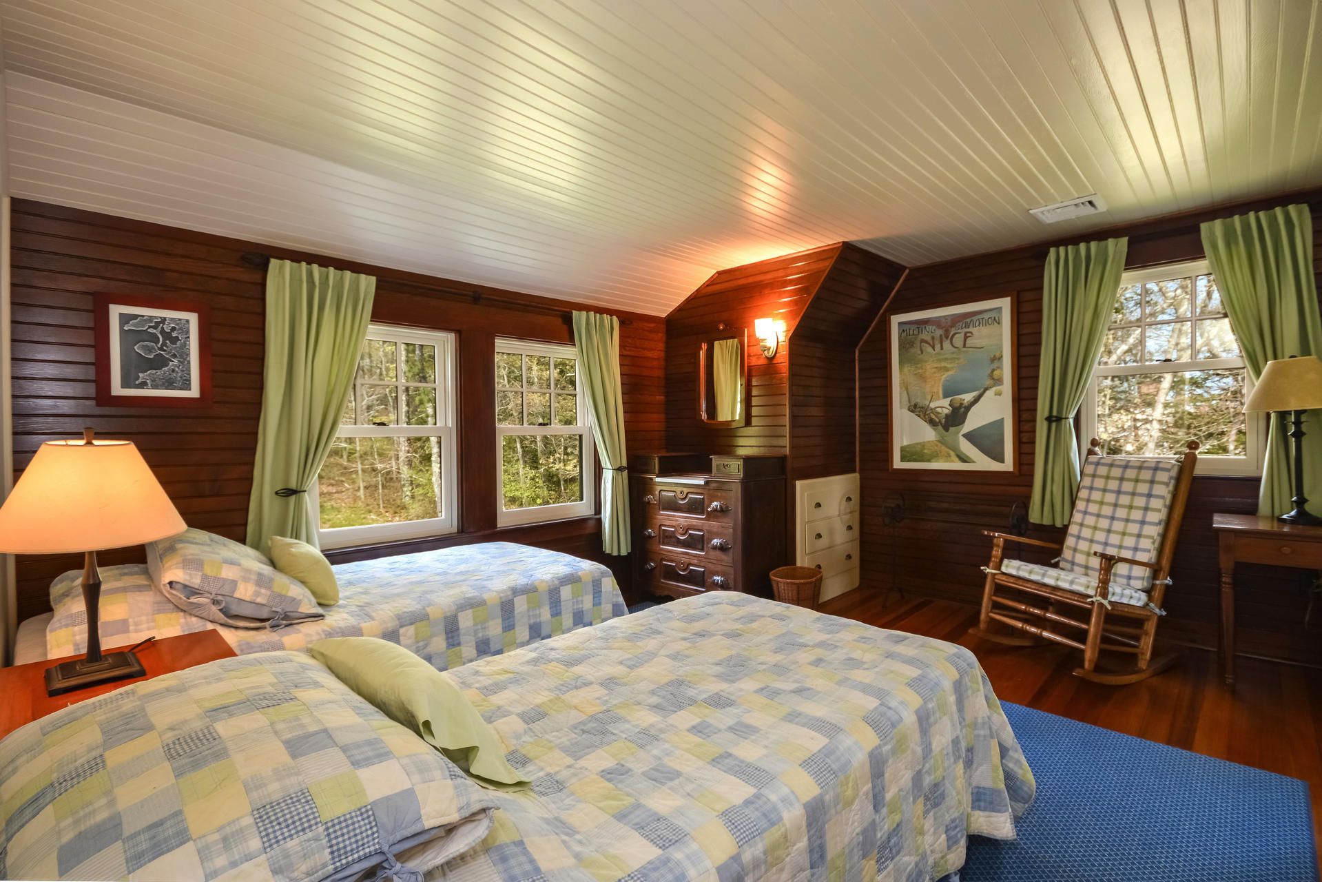 438 Scraggy Neck Road Cataumet, MA 02534 - Photo 22 of 33 a bedroom with a large bed and a large window