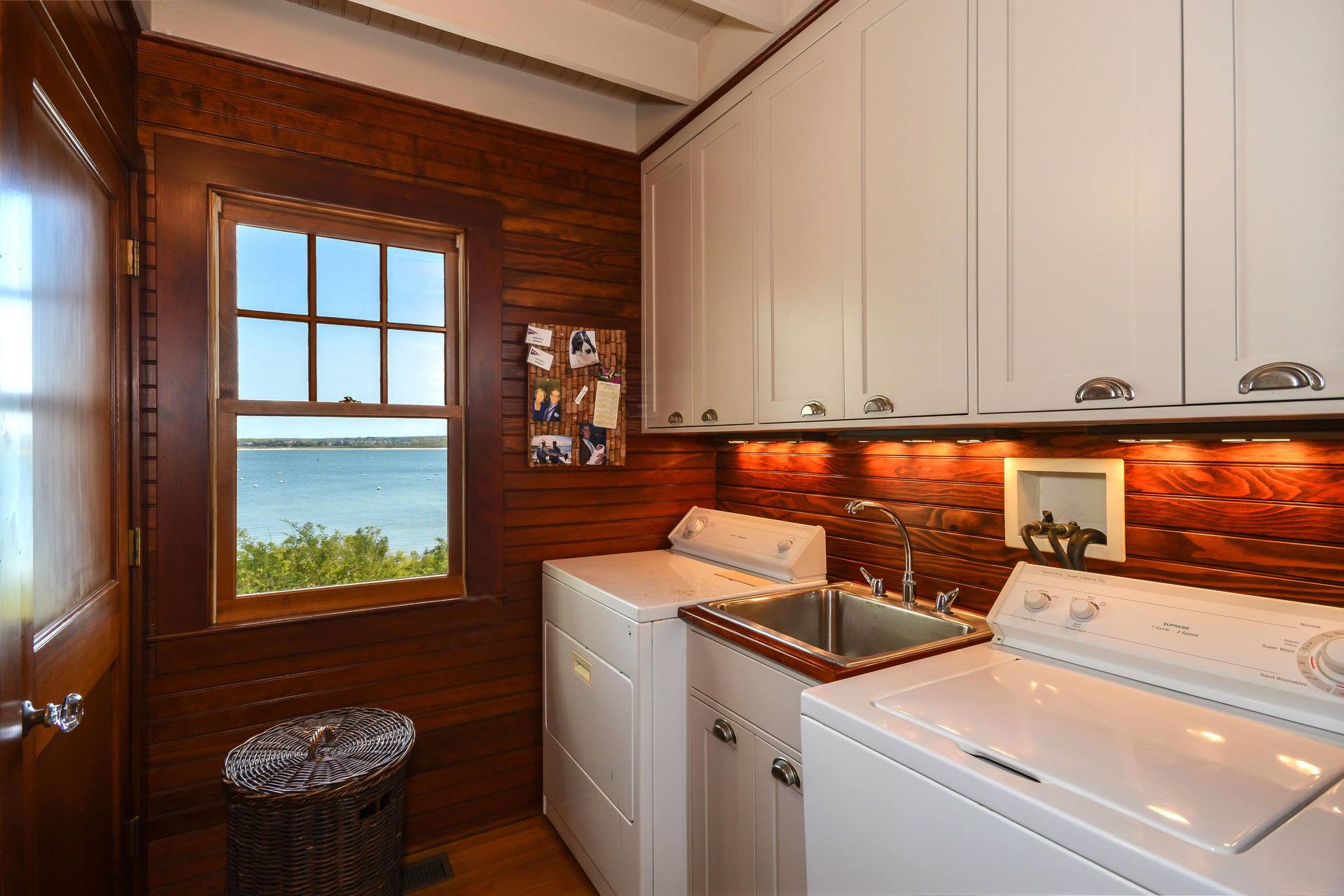 438 Scraggy Neck Road Cataumet, MA 02534 - Photo 23 of 33 a utility room with dryer and washer