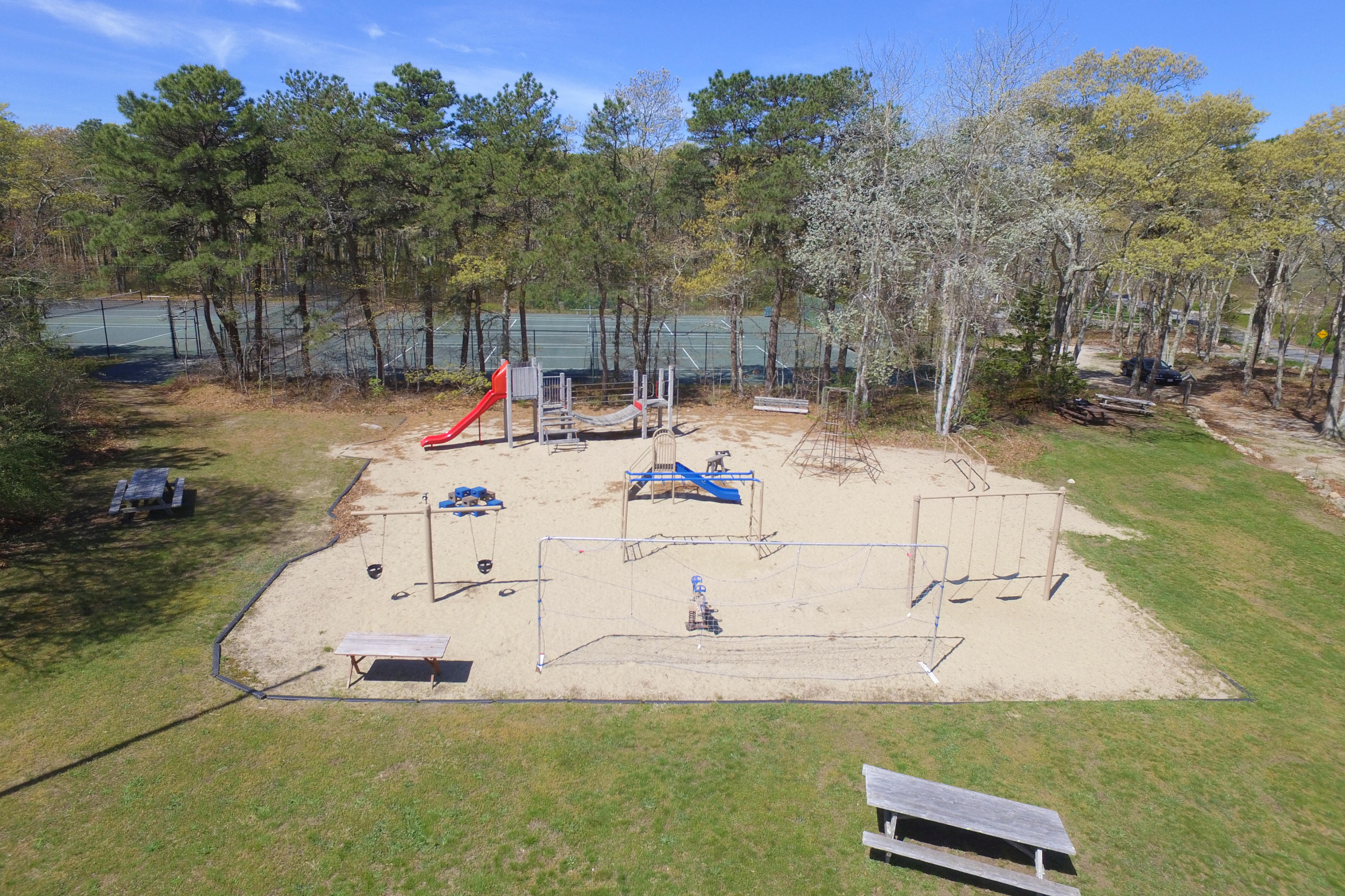 438 Scraggy Neck Road Cataumet, MA 02534 - Photo 30 of 33 a view of a swimming pool with a yard