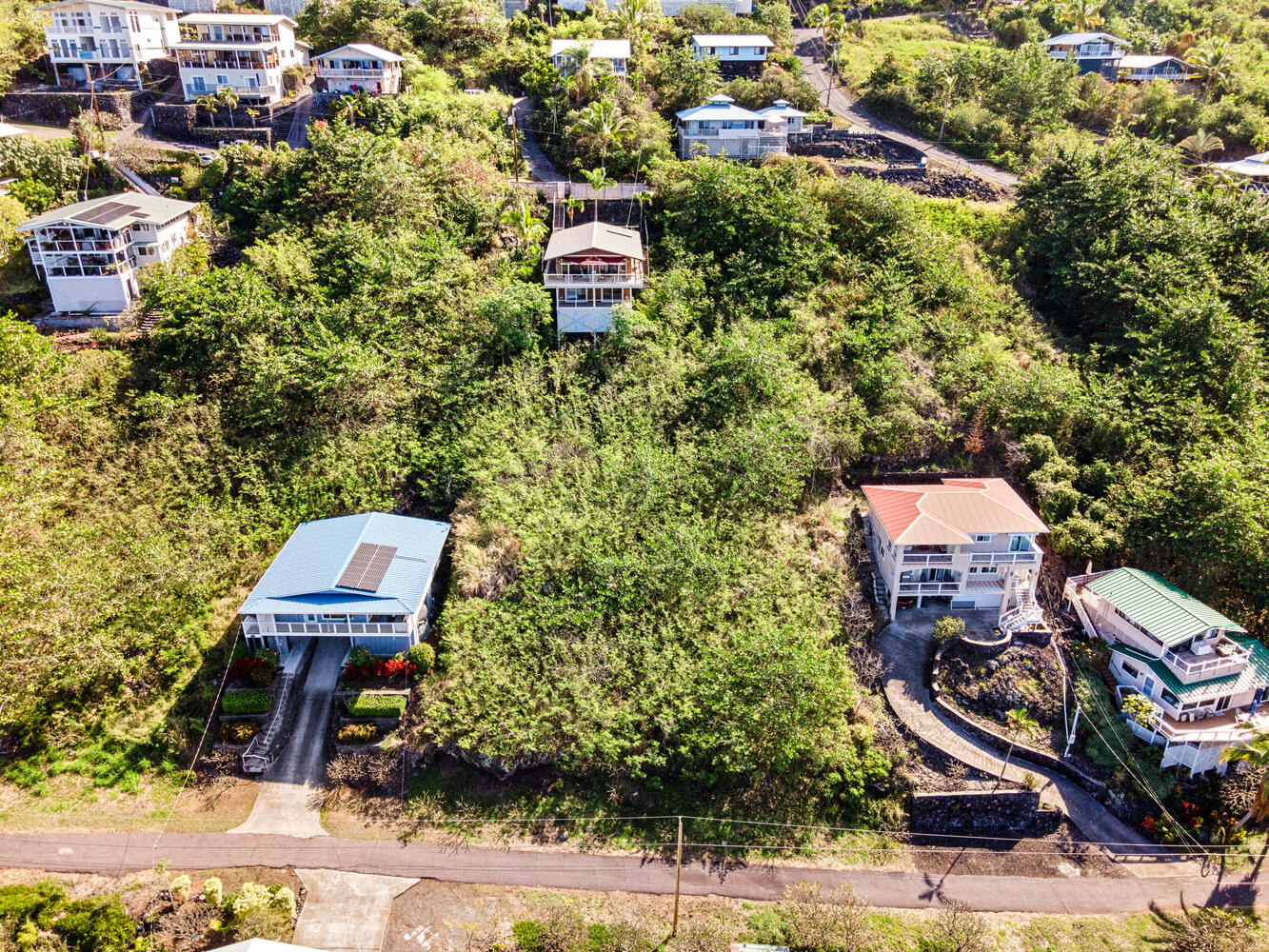146 Fern Road Captain Cook, HI 96704 - Photo 2 of 14 an aerial view of a house with outdoor space